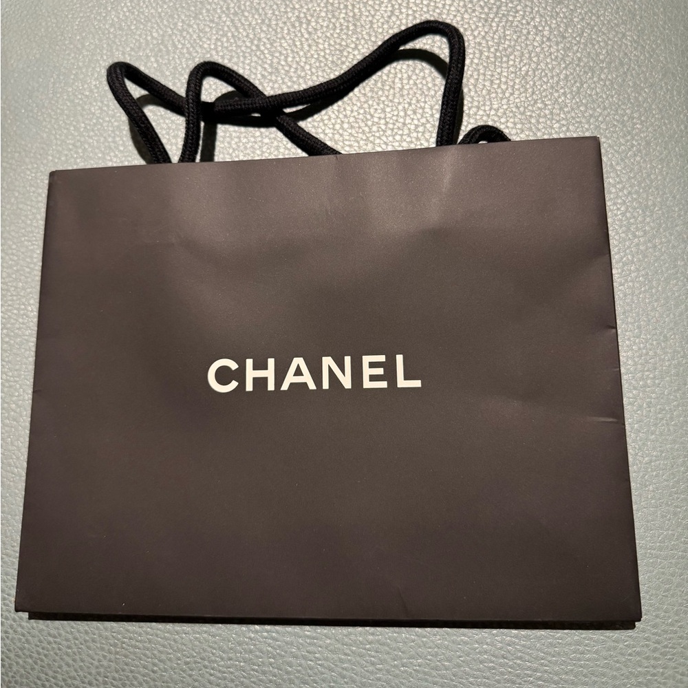 Chanel small paper bag for compact wallets or cologne